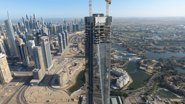 Uptown Tower by DMCC Tops Out at 329 Metres